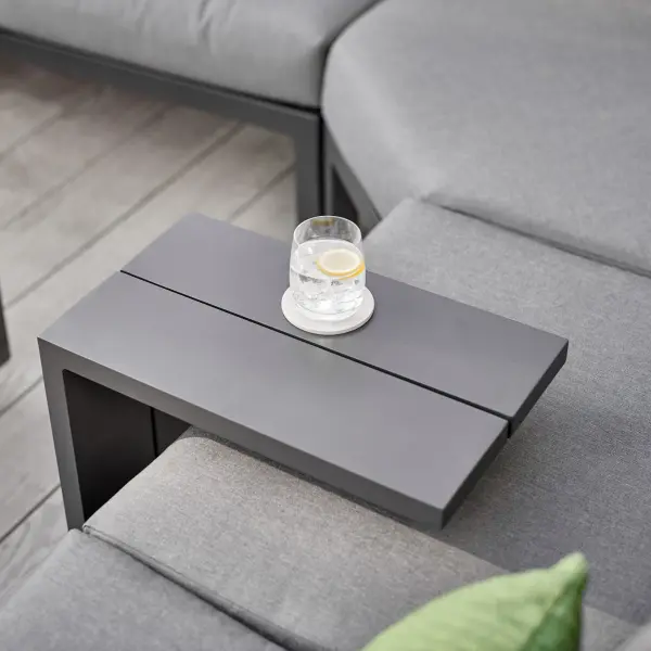 The Elba Side Table combines contemporary style with practical outdoor functionality. Its 19-inch depth makes it ideal for deep seating arrangements, while the rustproof aluminum construction ensures longevity in outdoor environments. - alternate view