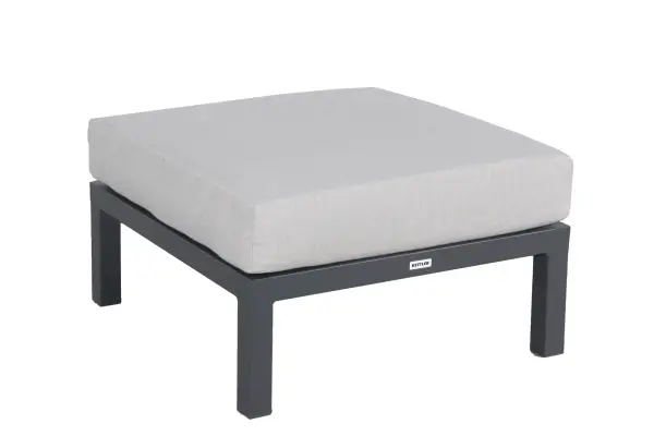 The Elba Ottoman combines lightweight aluminum construction with plush Sunbrella cushioning for outdoor comfort. Its charcoal powder-coated frame and reinforced tubing offer durability, while replaceable foot caps extend longevity.