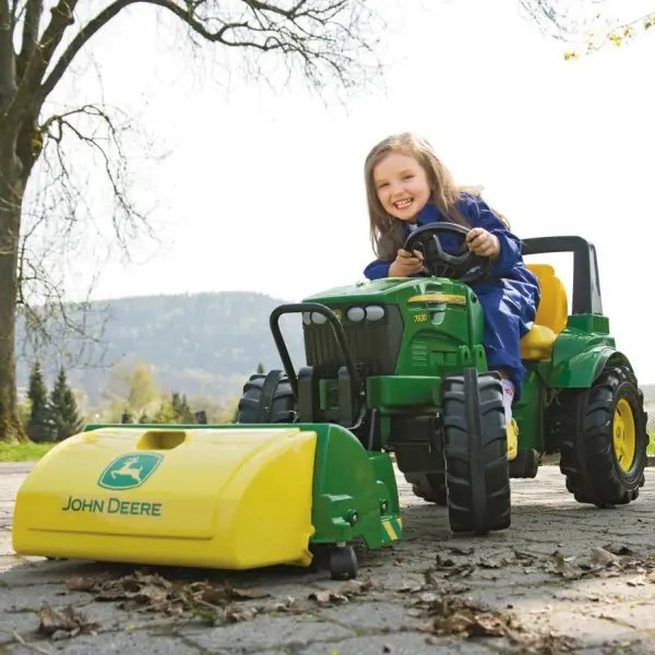 The rollyTrac Sweeper John Deere is a high-quality attachment sweeper that fits perfectly with all rolly toys children's pedal tractors with a front trailer hitch. With this functional sweeper, children can playfully keep their surroundings clean. The rollyTrac Sweeper John Deere features a collection container that reliably collects the sweepings. This container can be easily removed and emptied to make room for more. Thanks to its robust construction, the rollyTrac Sweeper John Deere is durable and robust. It can withstand intensive play and can be used outdoors without any problems. The sweeper is easy to assemble and can be effortlessly attached to the children's pedal tractor. With the rollyTrac Sweeper John Deere, children can playfully take on responsibility and learn to keep their surroundings clean. The sweeper promotes motor skills and an awareness of cleanliness and order. The attachment sweeper is an ideal accessory for all little tractor lovers who enjoy playing outdoors and want to be active. Fully functional sweeper with rotating brush roller Removable collection container Easy glide wheels Lifting lock bar Made in Germany View Product Manual - alternate view