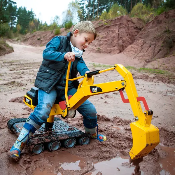 Italian-made ride-on digger featuring high carbon steel frame, mock hydraulic spring-assist levers, and tracked wheels for mobility. Designed for outdoor play in sand, gravel, and snow with full 360-degree rotation capability. - alternate view