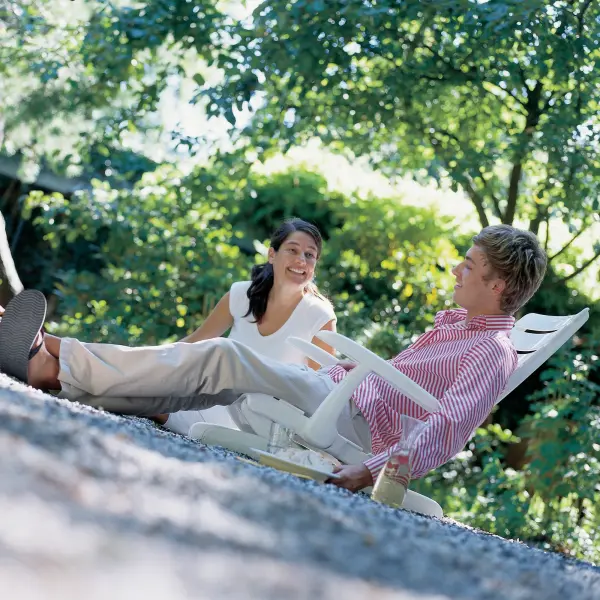 The Tiffany 5-Piece Polytec Dining Set combines German craftsmanship with weather-resistant materials for year-round outdoor dining. Features four 16-position reclining chairs and a scratch-resistant HPL table. - alternate view