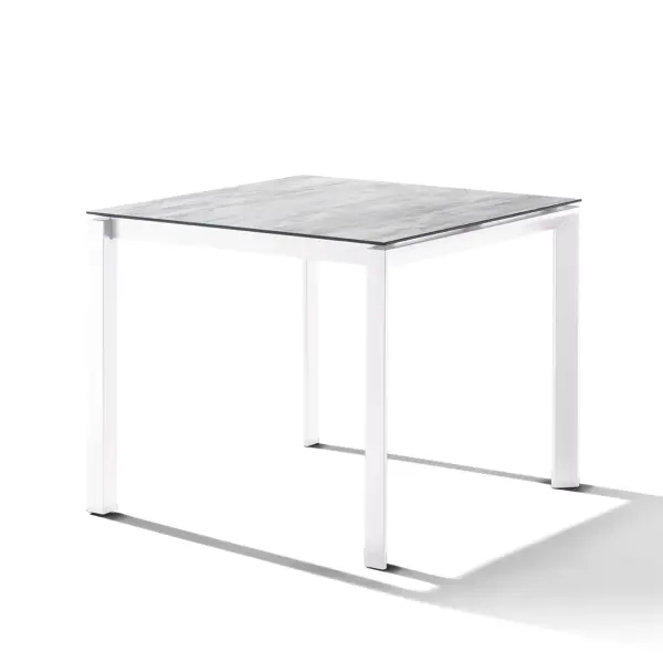 The Polytec Loft combines German engineering with contemporary design, featuring a 10mm HPL tabletop that resists scratching, warping, and extreme weather. Its powder-coated aluminum frame and self-cleaning surface make it ideal for year-round outdoor use. - alternate view