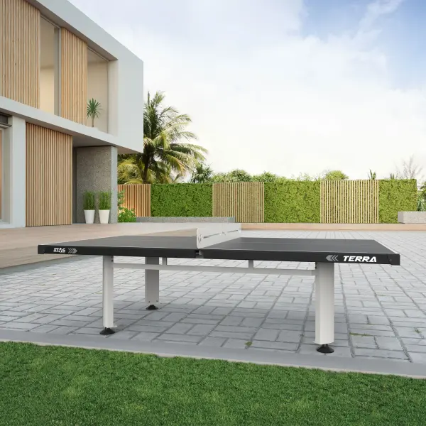 The Terra Outdoor combines tournament-quality play with weatherproof durability. Its PRO-TEC8 composite top delivers true ball bounce while withstanding outdoor elements. Heavy-duty steel construction and permanent metal net make this ideal for high-traffic residential and commercial settings. - alternate view