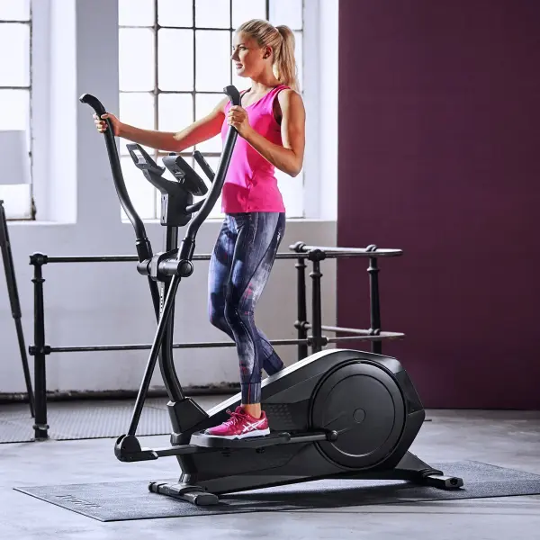 The KETTLER Rivo 4 delivers a complete low-impact cardio workout in a space-saving design. Its heavyweight drive system ensures smooth, quiet operation while the backlit display and advanced programming make tracking progress effortless. - alternate view