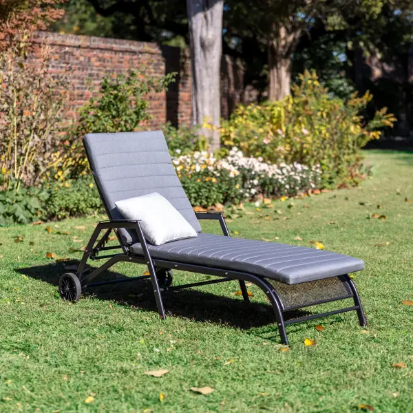 Sit back and relax under the sun on the Henley Lounger providing absolute comfort. Made from KETTLER’s durable mesh material, the Henley Lounger stays strong, withstanding season after season. KETTLER® utilizes an exclusive Electrotherm™ coating technology on all of wrought furniture. This finish is three (3) times thicker than a conventional powder coat. The Electrotherm™ coating creates an extremely smooth finish with obsolete weld points and resists scratching, peeling, fading and chipping. Another advantage is that the furniture will remain approximately twenty percent (20%) cooler after long sun exposure. Proprietary Electrotherm® coating resists scratching, chipping and fading and is cooler to the touch when compared to competitors when heated Fully-welded steel frame construction for optimal stability and durability Backrest easily reclines to offer six comfortable seating positions Rubberized wheels offer easy maneuverability and transport Protective, replaceable foot caps prevent marring on any surface and extends the life of the lounger Intricate steel mesh allows for easy flow drainage Easy assembly Sunbrella Lounge Cushion in Natte Charcoal Included (Small Pillow Not Included) Color: Iron Grey