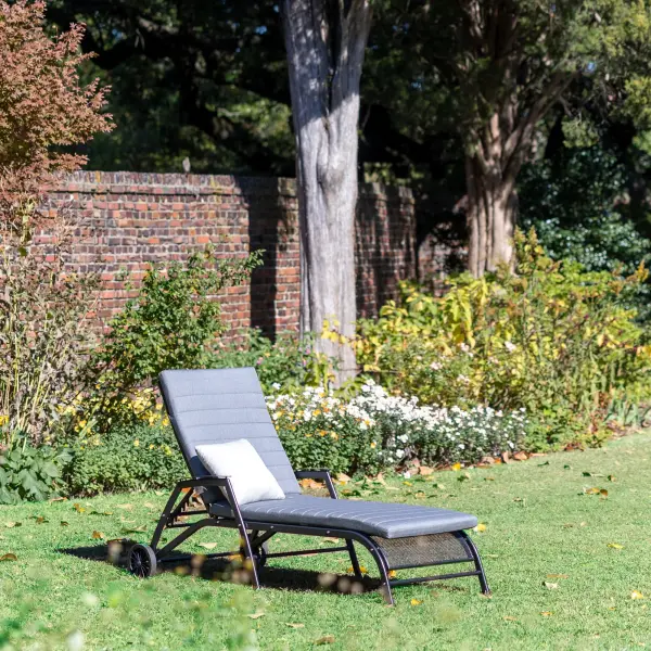 Sit back and relax under the sun on the Henley Lounger providing absolute comfort. Made from KETTLER’s durable mesh material, the Henley Lounger stays strong, withstanding season after season. KETTLER® utilizes an exclusive Electrotherm™ coating technology on all of wrought furniture. This finish is three (3) times thicker than a conventional powder coat. The Electrotherm™ coating creates an extremely smooth finish with obsolete weld points and resists scratching, peeling, fading and chipping. Another advantage is that the furniture will remain approximately twenty percent (20%) cooler after long sun exposure. Proprietary Electrotherm® coating resists scratching, chipping and fading and is cooler to the touch when compared to competitors when heated Fully-welded steel frame construction for optimal stability and durability Backrest easily reclines to offer six comfortable seating positions Rubberized wheels offer easy maneuverability and transport Protective, replaceable foot caps prevent marring on any surface and extends the life of the lounger Intricate steel mesh allows for easy flow drainage Easy assembly Sunbrella Lounge Cushion in Natte Charcoal Included (Small Pillow Not Included) Color: Iron Grey - alternate view