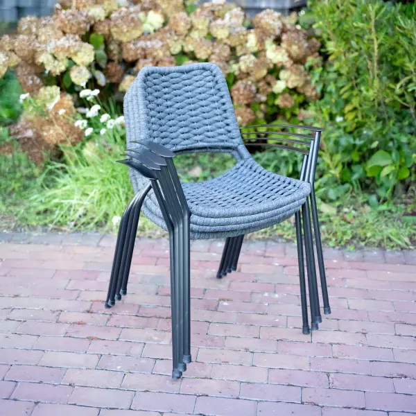 The Metro Rope Stackable Arm Chair set combines contemporary style with outdoor durability. Featuring UV-resistant rope weaving, contoured comfort, and stackable design, this 6-piece set is perfect for patios and dining areas.