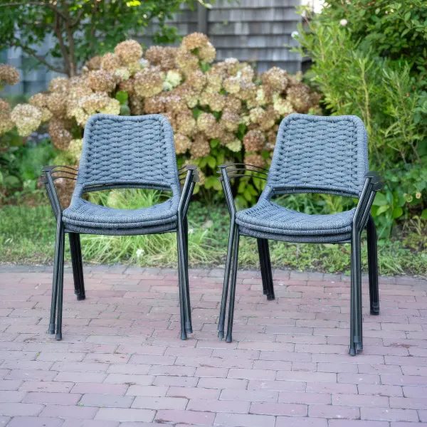 The Metro Rope Stackable Arm Chair set combines contemporary style with outdoor durability. Featuring UV-resistant rope weaving, contoured comfort, and stackable design, this 6-piece set is perfect for patios and dining areas. - alternate view