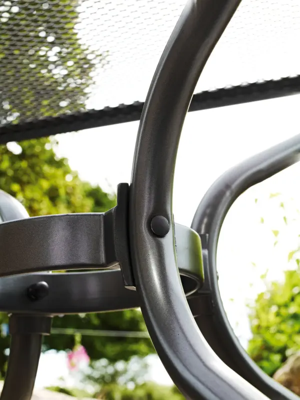 This 28-inch round table features KETTLER's exclusive Electrotherm coating technology, offering superior scratch, chip, and fade resistance. The fully-welded steel construction and mesh top design ensure lasting durability. - alternate view