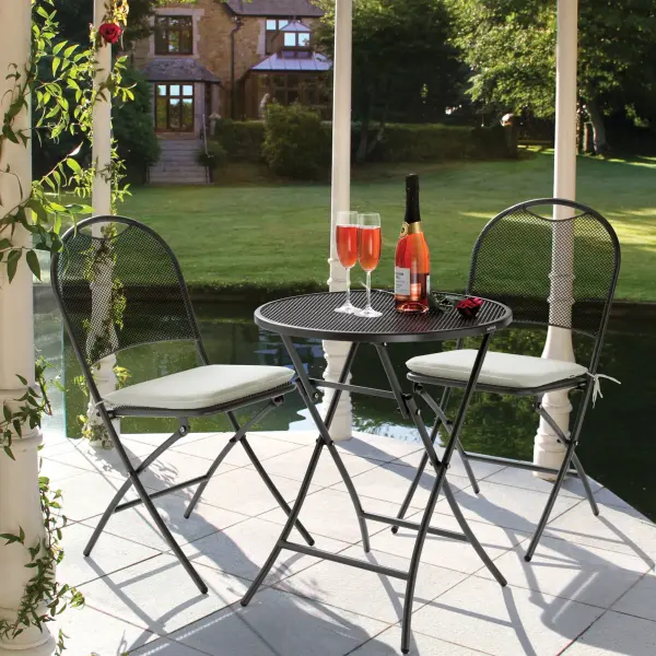 The Cafe Napoli brings Mediterranean charm to outdoor spaces with its steel mesh construction and proprietary Electrotherm coating. Foldable design allows easy storage while contoured seating ensures comfort.