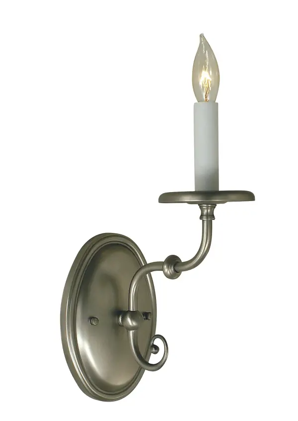 This wall sconce embodies authentic Early American design with rustic simplicity and refined workmanship. The warm antique brass finish adds character to traditional and farmhouse interiors while providing reliable ambient lighting.