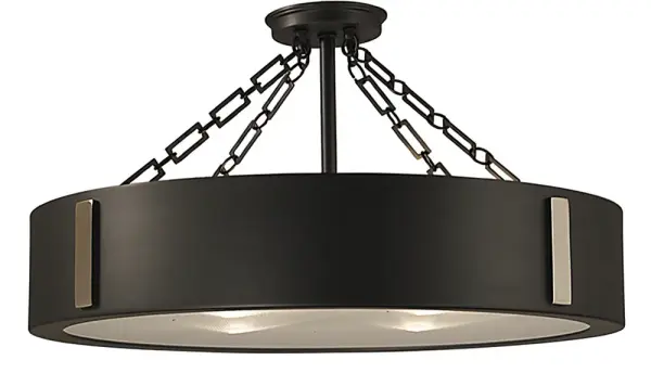 The Oracle flush mount combines charcoal and polished nickel finishes for a refined, modern aesthetic. Its 16-inch diameter and low 11.5-inch profile make it ideal for rooms with standard ceiling heights while providing ample illumination.