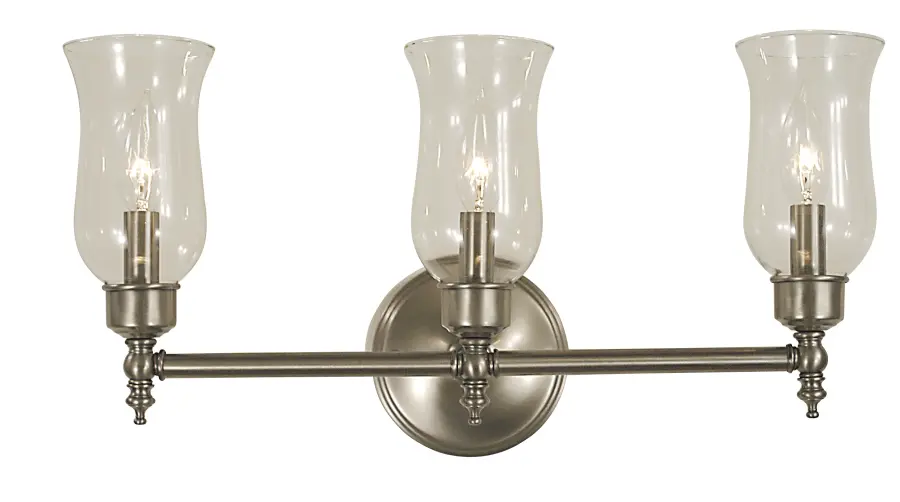 Three Light Wall Sconce in Antique Brass