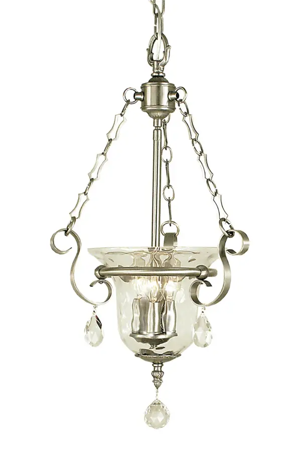 The Carcassonne pendant combines traditional elegance with versatile styling. Three candle-style lights with clear mottled glass shades create warm ambient lighting, while the brushed nickel finish adds contemporary appeal.