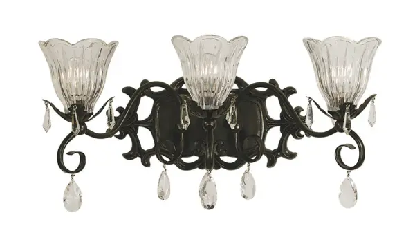 The Liebestraum 3-light sconce combines traditional elegance with luxurious cut crystal shades and a rich mahogany bronze finish. At 23 inches wide, this substantial wall fixture makes a dramatic statement in formal spaces.