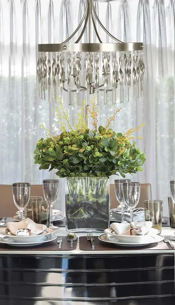 The Adele 5-Light Pendant combines classic candelabra styling with contemporary two-tone metalwork. Its 24-inch width and mixed Satin Pewter/Polished Nickel finish create visual interest while maintaining versatility across design styles. - alternate view