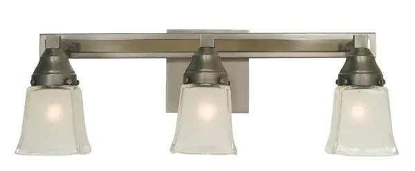 The Mercer sconce combines satin pewter and polished nickel finishes with frosted glass shades for a refined transitional look. Its 21-inch width provides substantial illumination perfect for vanities and hallways.