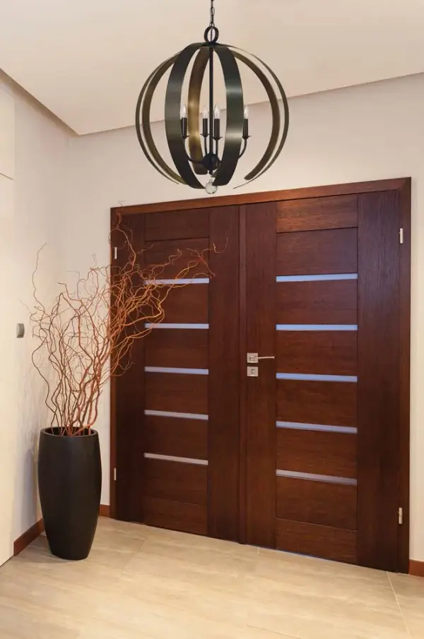 The Venus chandelier brings timeless elegance with its 6-light candle-style design and warm mahogany bronze finish. At 24 inches wide, it's perfectly sized for medium dining rooms and entryways, offering versatile traditional styling. - alternate view