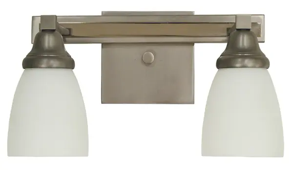The Mercer sconce combines satin pewter and polished nickel finishes for sophisticated visual interest. Its dual white glass shades provide ample illumination while the compact 13.5-inch width fits standard vanity and hallway applications.