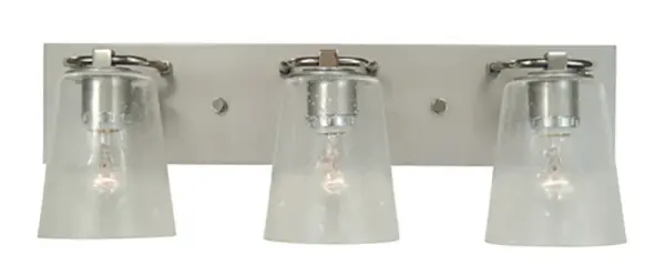 The Mercer bath sconce combines satin pewter and polished nickel finishes with clear seedy glass shades for a sophisticated transitional look. At 24 inches wide, it provides ample illumination for medium to large vanities.