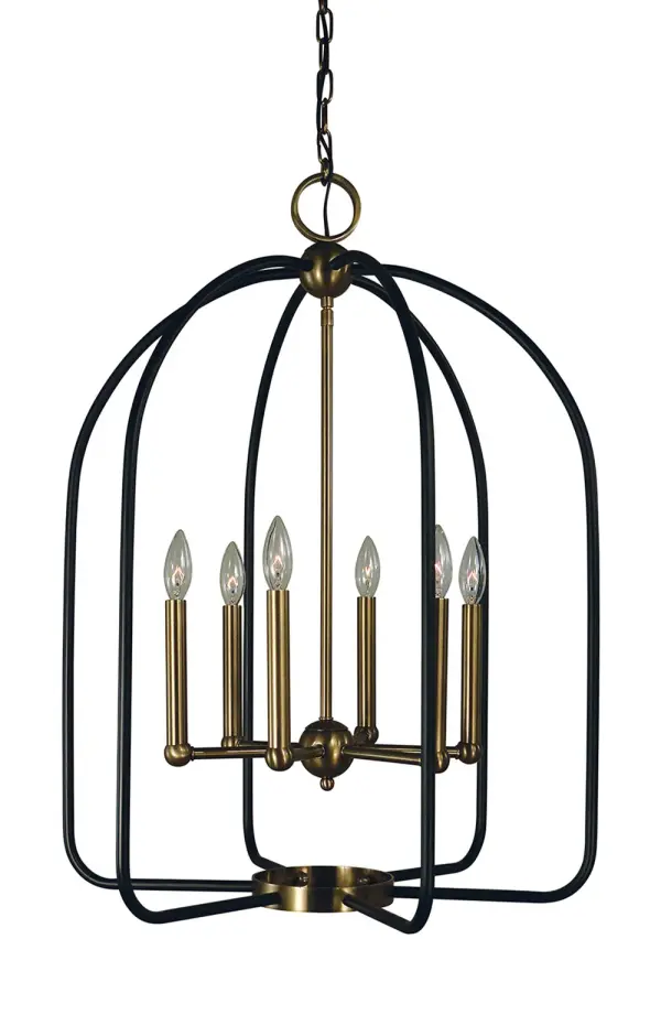 The Boulevard chandelier combines warm antique brass with modern matte black accents for a versatile transitional design. Its 6-light configuration and 23-inch width make it perfect for medium-sized dining spaces.