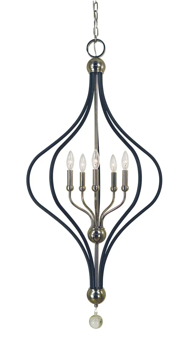 The Boulevard 5-Light Chandelier combines polished nickel and matte black finishes for a refined transitional look. Its 22-inch width and adjustable height make it versatile for various dining spaces.