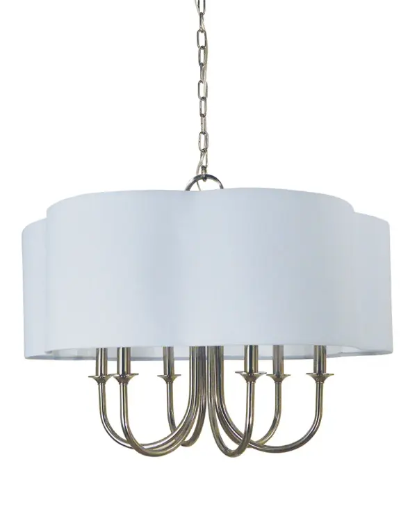 The Desire chandelier combines classic candelabra styling with a contemporary drum shade, creating a versatile fixture that bridges traditional and modern aesthetics. Its polished nickel finish adds refined elegance.
