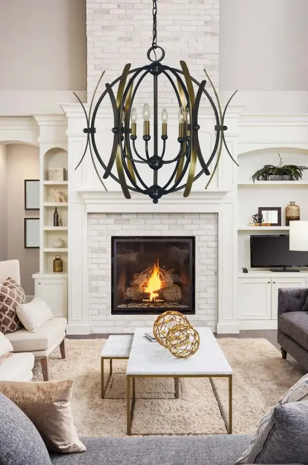 The Monique 6-Light Chandelier combines classic design with sophisticated finishes. Its 27-inch diameter makes it perfect for medium-sized dining rooms, while the mahogany bronze and antique brass accents add warmth and elegance. - alternate view