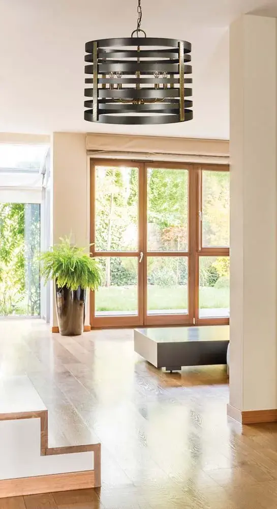 This 5-light chandelier brings timeless pastoral charm with its mahogany bronze finish and antique brass accents. At 21 inches wide, it's perfectly sized for medium dining rooms, offering warm ambient lighting through candle-style bulbs. - alternate view