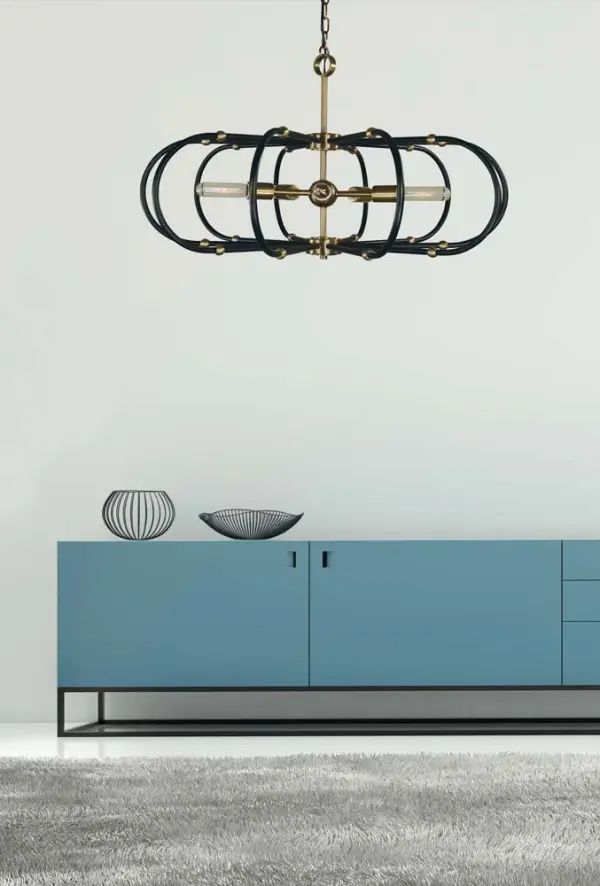 The Pulsar 5-Light Chandelier combines antique brass warmth with modern matte black accents in a striking 30-inch design. Perfect for medium to large dining spaces, this fixture delivers substantial presence with versatile style. - alternate view