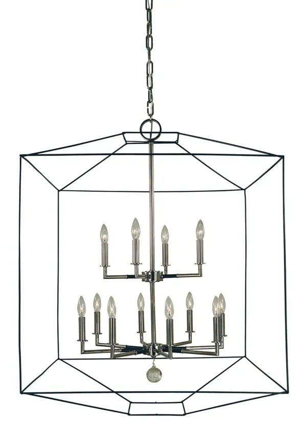 The Isabella chandelier makes a dramatic statement with 12 candle-style lights arranged in a 30-inch wide frame. The sophisticated pairing of polished nickel and matte black creates visual interest while maintaining versatility across design styles.