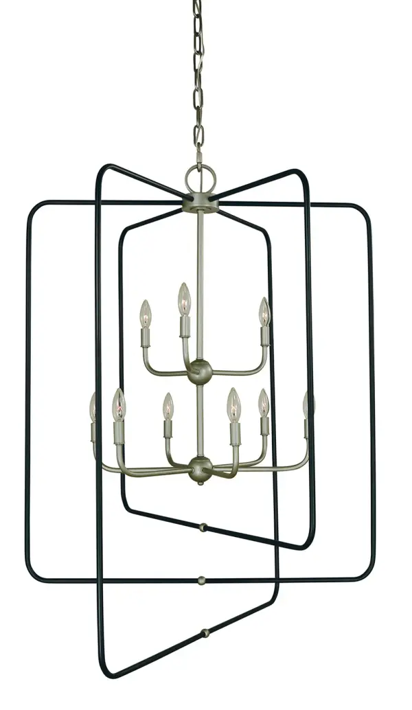The Montrose 9-light foyer chandelier commands attention with its impressive 33-inch width and 44-inch height. The sophisticated satin pewter finish with matte black accents creates visual depth while the 9 candle-style lights provide ample illumination.