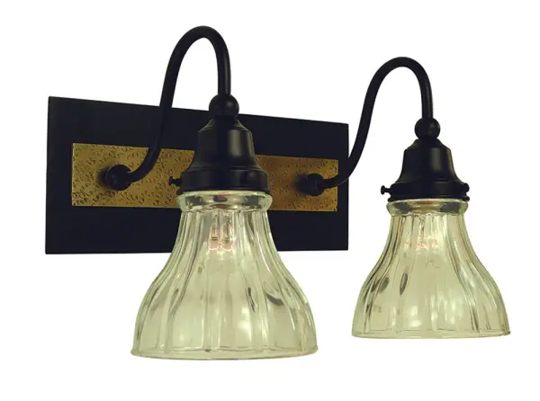 The Houghton sconce combines matte black and antique brass finishes for a striking transitional look. Clear glass shades showcase vintage-style bulbs while the dual-finish design adds visual interest to any space.