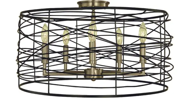The Boca flush mount combines brushed nickel and matte black finishes in a contemporary wire cage design. With five candelabra bulbs and a 22-inch width, it provides substantial illumination while maintaining a low 12-inch profile.