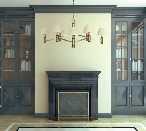 The Hampton chandelier combines antique brass warmth with modern matte black accents across eight candle-style lights. Its generous 40-inch width and elegant linen shades create a refined focal point for formal dining spaces. - alternate view