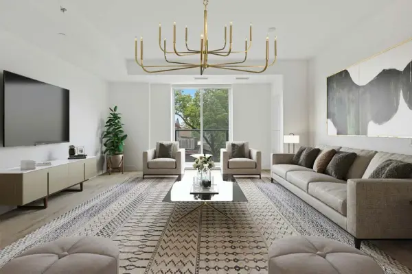 The Manhattan foyer chandelier commands attention with its impressive 72-inch width and 14 candelabra lights. Designed for grand entryways and two-story spaces, this oversized fixture delivers maximum impact with warm brushed brass finish. - alternate view