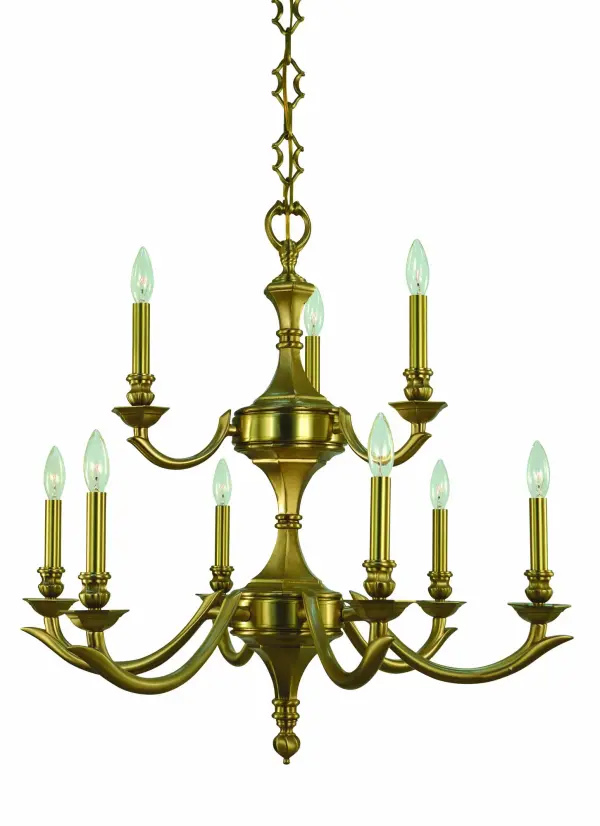 The Scarsdale chandelier combines transitional elegance with contemporary clean lines. Nine candelabra lights provide ample illumination, while the brushed brass finish adds warmth and sophistication to dining spaces.