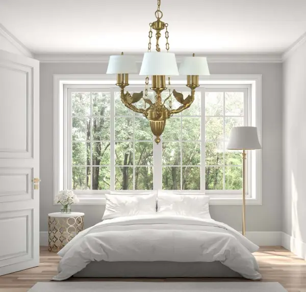 The Ascension chandelier brings sophisticated contemporary style with its 9-light configuration and warm brushed brass finish. At 28 inches wide, it's perfectly scaled for medium dining spaces and kitchen islands. - alternate view
