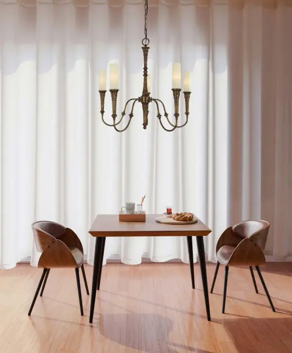 The Old Greenwich chandelier brings timeless sophistication to dining spaces with its 5-light design and warm antique brass finish. Matte white glass cylinders provide soft, diffused light while the traditional silhouette works beautifully in both coastal and transitional interiors. - alternate view