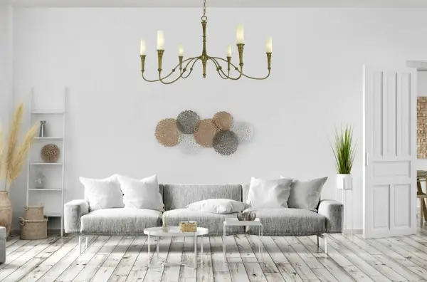 The Old Greenwich chandelier combines classic design with coastal-inspired elegance. Its 46-inch linear profile and antique brass finish create a sophisticated focal point, while six candle-style lights provide ample illumination. - alternate view
