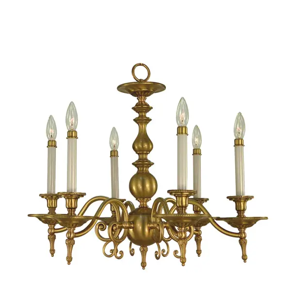 The Kensington 6-Light Chandelier combines timeless candle-style design with warm brushed brass finish. At 26 inches wide, it's perfectly scaled for most dining rooms while the traditional silhouette complements both classic and transitional interiors.