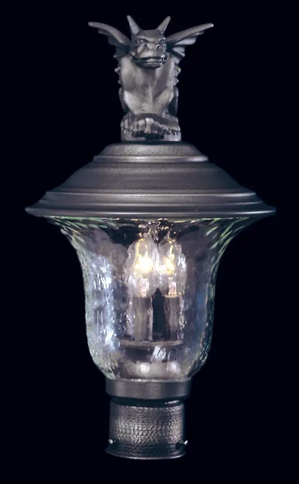 The Carcassonne post mount brings Old World charm to outdoor spaces with its iron finish and clear mottled glass. Three candelabra lights provide warm illumination for entryways and pathways.