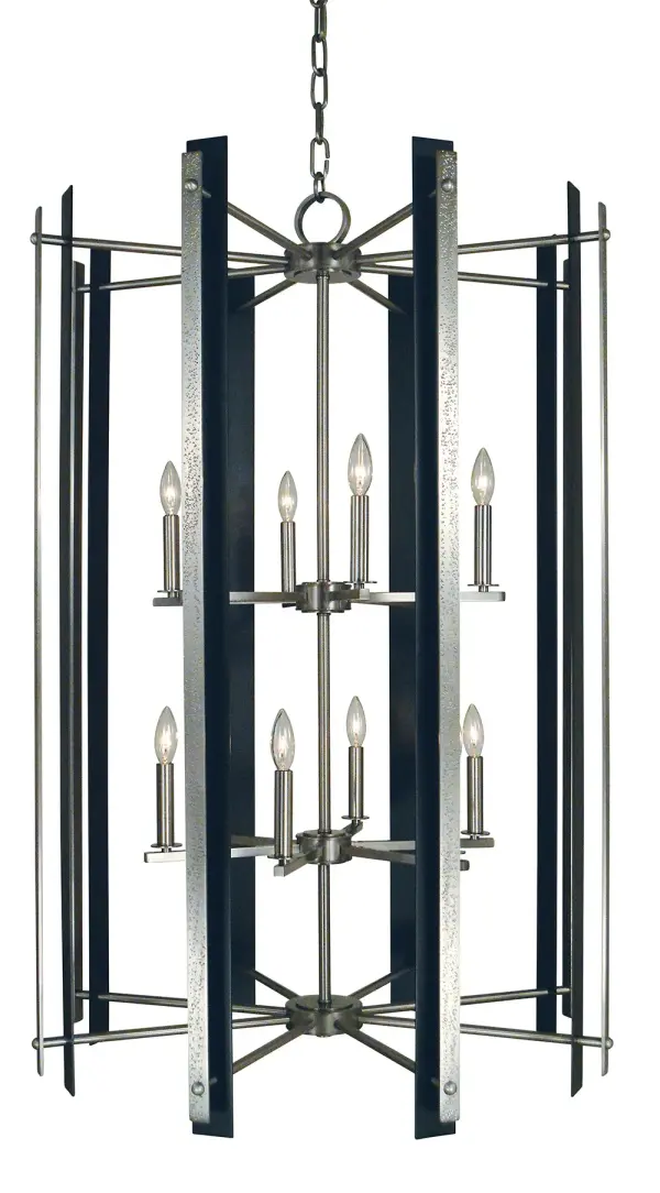 The Bucolic chandelier makes a bold statement with its generous 31-inch width and 12 candle-style lights. The mixed metal finish of brushed nickel and matte black creates visual interest while maintaining versatility across design styles.