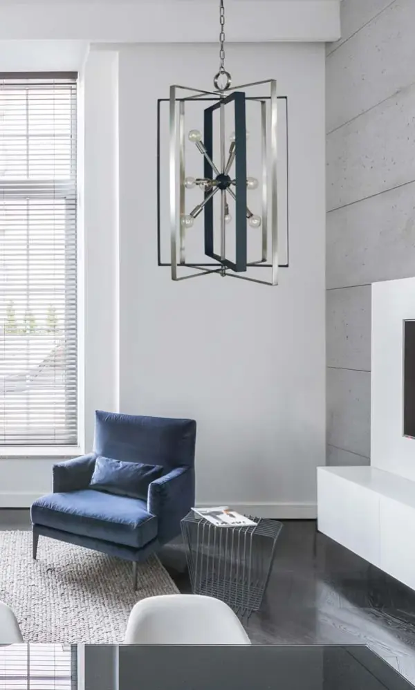 The Interstellar Foyer Chandelier combines brushed nickel and matte black finishes in a contemporary design perfect for grand entryways. With 11 lights and dramatic vertical presence, it creates impressive illumination for high-ceiling spaces. - alternate view