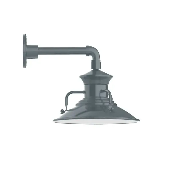 Our outdoor wall lights, inspired by 1920's industrial lighting, in straight arm styles are great for use as sign or awning lights, garage or barn lights. This vintage look works well indoors, as a wall sconce to illuminate an entry or hallway, stairway, or bathroom. The Homestead shade with its cap and handles, has farmhouse flair, at home over a kitchen table or a wide front porch. Collection: Homestead Finish: Slate Gray Glass: Clear Glass with Cast Guard Notes: Option (1) A19 LED and 2-Integrated 8W, 10W Width: 12.13" Height: 12.00" Length: 16.00" Weight: 8.00 lb Extension from Wall: 16.00" Canopy: 4.625" diameter Number of Bulbs: 1 Maximum Wattage: 100.00 W Bulb Type: A19 Bulb Base: E26 Medium Light Source: Incandescent or LED equivalent Dimmable Voltage: 120.00 V Country of Origin: US Safety Listing: UL/cUL Safety Rating: Wet Dark Sky LED Manufacturer Warranty: 1-year limited warranty on the fixture.