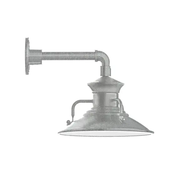 Our outdoor wall lights, inspired by 1920's industrial lighting, in straight arm styles are great for use as sign or awning lights, garage or barn lights. This vintage look works well indoors, as a wall sconce to illuminate an entry or hallway, stairway, or bathroom. The Homestead shade with its cap and handles, has farmhouse flair, at home over a kitchen table or a wide front porch. Collection: Homestead Finish: Painted Galvanized Glass: 12 inch Homestead Notes: Option (1) A19 LED and 2-Integrated 8W, 10W Width: 12.13" Height: 12.00" Length: 16.00" Weight: 8.00 lb Extension from Wall: 16.00" Canopy: 4.625" diameter Number of Bulbs: 1 Maximum Wattage: 100.00 W Bulb Type: A19 Bulb Base: E26 Medium Light Source: Incandescent or LED equivalent Dimmable Voltage: 120.00 V Country of Origin: US Safety Listing: UL/cUL Safety Rating: Wet Dark Sky LED Manufacturer Warranty: 1-year limited warranty on the fixture.
