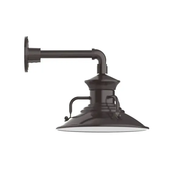Our outdoor wall lights, inspired by 1920's industrial lighting, in straight arm styles are great for use as sign or awning lights, garage or barn lights. This vintage look works well indoors, as a wall sconce to illuminate an entry or hallway, stairway, or bathroom. The Homestead shade with its cap and handles, has farmhouse flair, at home over a kitchen table or a wide front porch. Collection: Homestead Finish: Architectural Bronze Glass: 12 inch Homestead Width: 12.13" Height: 12.00" Length: 16.00" Weight: 8.00 lb Extension from Wall: 16.00" Canopy: 4.625" diameter Number of Bulbs: 1 Maximum Wattage: 10.00 W Light Source: LED Light Output: 800.00 lm Color Temperature: 3000 K CRI: 90 Dimmable Rated Average Life: 50,000 Voltage: 120.00 V Country of Origin: US Safety Listing: UL/cUL Safety Rating: Wet Dark Sky LED Manufacturer Warranty: 1-year limited warranty on the fixture.