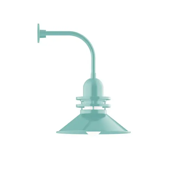 Our outdoor wall lights, inspired by 1920's industrial lighting, in curved arm styles are great for use as sign or awning lights, garage or barn lights. This vintage look works well indoors also, our smallest sizes will illuminate a restaurant menu board, bookcase, or shelving unit. The Atomic has a great retro feel and will lighten up any space. A clear glass jar to protect bulb from the elements is a standard feature. Collection: Atomic Finish: Sea Green Glass: 18 inch Atomic Notes: Option (1) A19 LED and 4-Integrated 8W, 10W, 15W, 25W Width: 18.00" Height: 26.50" Length: 22.50" Weight: 12.00 lb Extension from Wall: 22.50" Canopy: 4.625" diameter Number of Bulbs: 1 Maximum Wattage: 200.00 W Bulb Type: A19 Bulb Base: E26 Medium Light Source: Incandescent or LED equivalent Dimmable Voltage: 120.00 V Country of Origin: US Safety Listing: UL/cUL Safety Rating: Wet Dark Sky LED Manufacturer Warranty: 1-year limited warranty on the fixture.