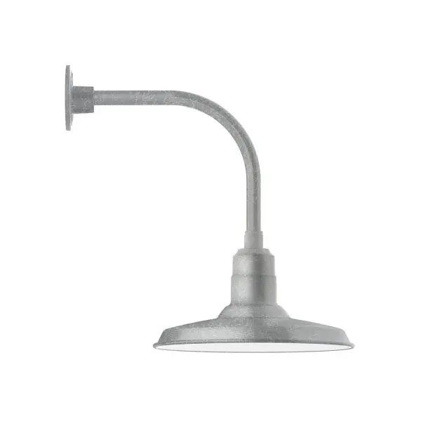 Our outdoor wall lights, inspired by 1920's industrial lighting, in curved arm styles are great for use as sign or awning lights, garage or barn lights. This vintage look works well indoors also, our smallest sizes will illuminate a restaurant menu board, bookcase, or shelving unit. The Warehouse shade is our most popular shade style, and we offer in a large variety of sizes. Collection: Warehouse Finish: Painted Galvanized Glass: Clear Glass with Cast Guard Notes: Option (1) A19 LED and 3-Integrated 8W, 10W, 15W Width: 14.50" Height: 20.38" Length: 20.88" Weight: 12.00 lb Extension from Wall: 20.88" Canopy: 4.625" diameter Number of Bulbs: 1 Maximum Wattage: 100.00 W Bulb Type: A19 Bulb Base: E26 Medium Light Source: Incandescent or LED equivalent Dimmable Voltage: 120.00 V Country of Origin: US Safety Listing: UL/cUL Safety Rating: Wet Dark Sky LED Manufacturer Warranty: 1-year limited warranty on the fixture.