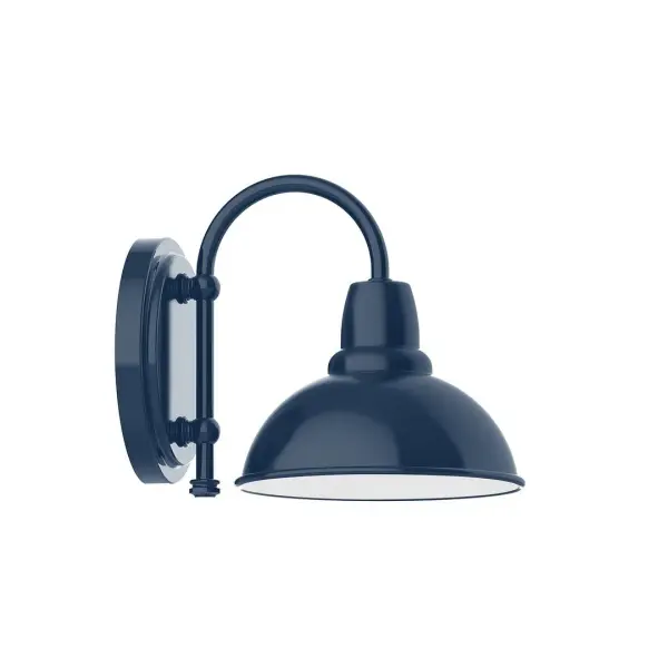 Our wall sconces are our smallest outdoor fixtures, but they add just the right amount of light to your entryway. Hang alone or in pairs on either side of a front door or garage, even inside next to a bed. Available in multiple shade styles to suit your décor, be it modern farmhouse, coastal cottage, or industrial loft. Collection: Cafe Finish: Navy Glass: 8 inch Cafe Notes: Option (1) A19 LED and 1-Integrated 8W Width: 8.13" Height: 8.88" Length: 10.75" Weight: 7.00 lb Extension from Wall: 10.75" Canopy: 6.875" diameter Number of Bulbs: 1 Maximum Wattage: 100.00 W Bulb Type: A19 Bulb Base: E26 Medium Light Source: Incandescent or LED equivalent Dimmable Voltage: 120.00 V Country of Origin: US Safety Listing: UL/cUL Safety Rating: Wet Dark Sky LED Manufacturer Warranty: 1-year limited warranty on the fixture.